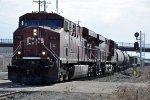 Westbound manifest crosses over to enter the yard